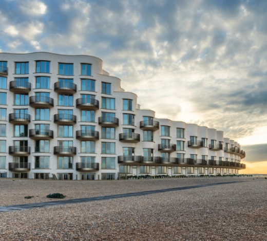 Beachfront exterior shot of Shoreline, Folkestone development delivered by contractor, Jenner
