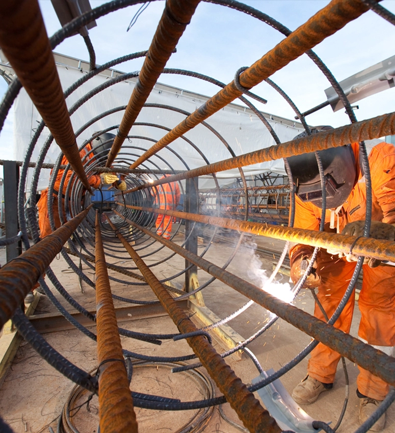 Site employees of civil engineering and construction company, J.Murphy & Sons working in an underground tunnel