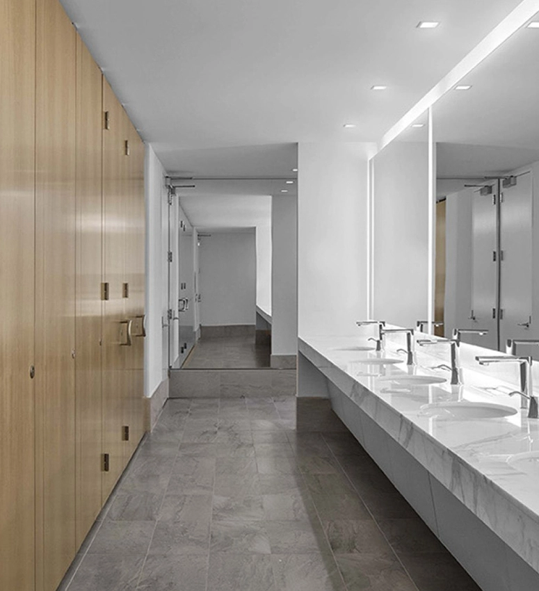 Venesta toilets and washrooms sitting alongside a computer screen showing Fabrick's PPC results